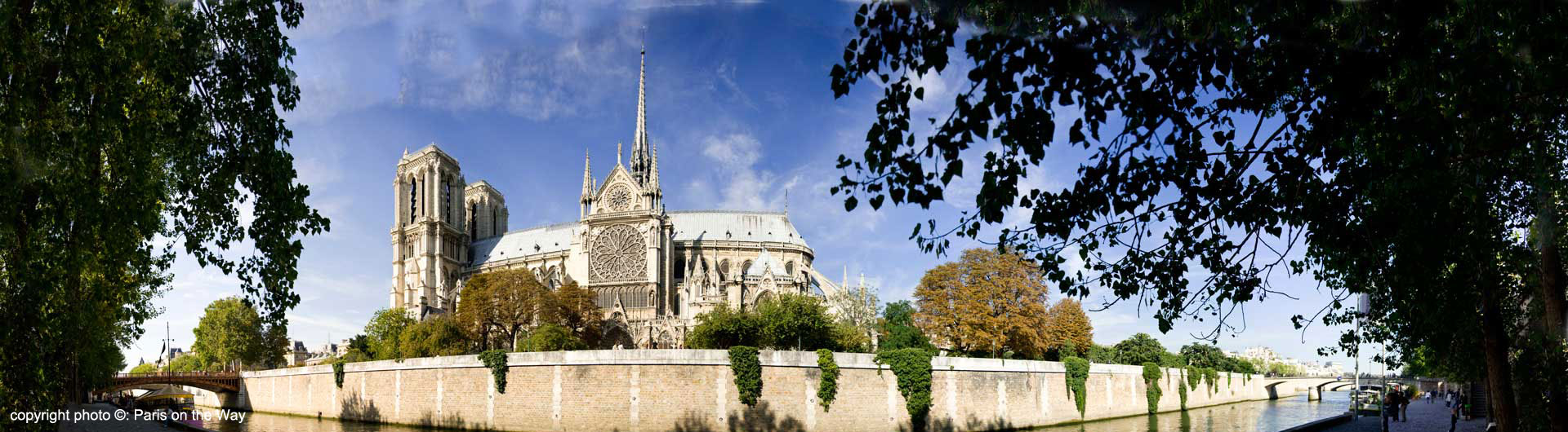 ROSE WINDOWS & FLYING BUTTRESSES VIEW FROM THE RIVER SEINE